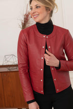 Suppleness defines this red lambskin jacket, cut slim for fit. - Image n°3