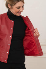 Suppleness defines this red lambskin jacket, cut slim for fit. - Image n°5