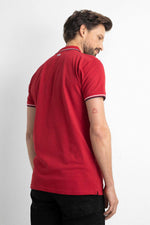Red polo shirt with striped sleeves and collar - Image n°2