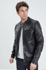 Washed lambskin jacket in black, slim and adjustable for a sharp look. - Image n°1