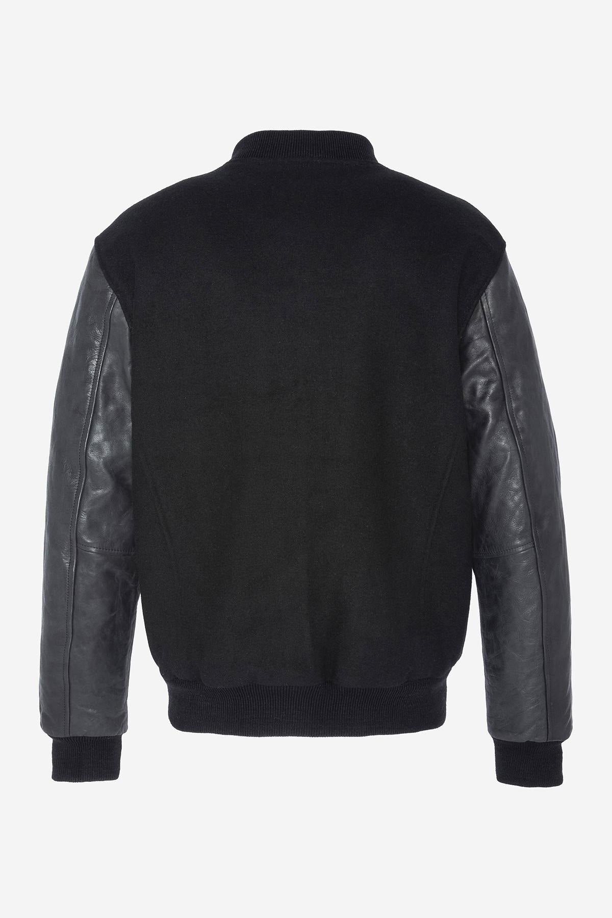 Schott's iconic black varsity jacket blends wool and cowhide leather. - Image n°6