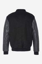 Schott's iconic black varsity jacket blends wool and cowhide leather. - Image n°6