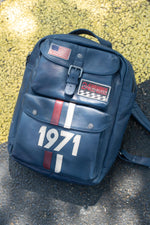 Racing-style backpack in navy blue leather - Image n°1