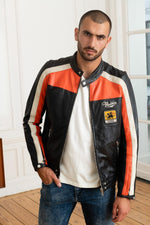 Redskins' black sheepskin jacket with bold orange and white stripes. - Image n°6