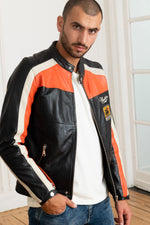 Redskins' black sheepskin jacket with bold orange and white stripes. - Image n°3