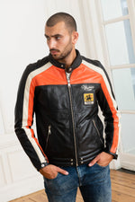 Redskins' black sheepskin jacket with bold orange and white stripes. - Image n°7