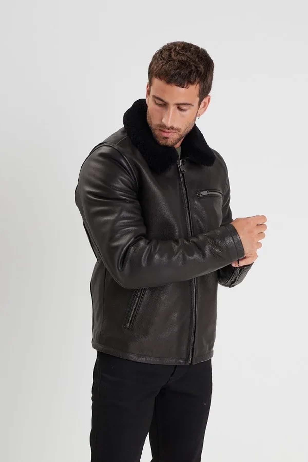 Black grain-textured cowhide jacket with detachable fur collar. - Image n°6