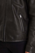 Black grain-textured cowhide jacket with detachable fur collar. - Image n°4