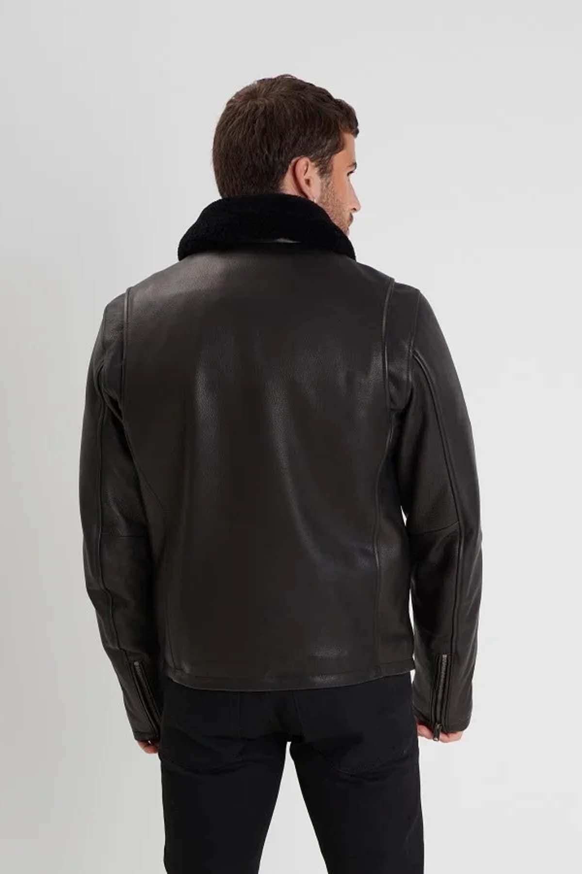 Black grain-textured cowhide jacket with detachable fur collar. - Image n°7