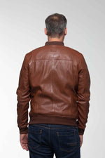 Steve McQueen's maroon lambskin jacket: racing patches, vintage fit. - Image n°4