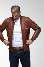 Steve McQueen's maroon lambskin jacket: racing patches, vintage fit. - Image n°5
