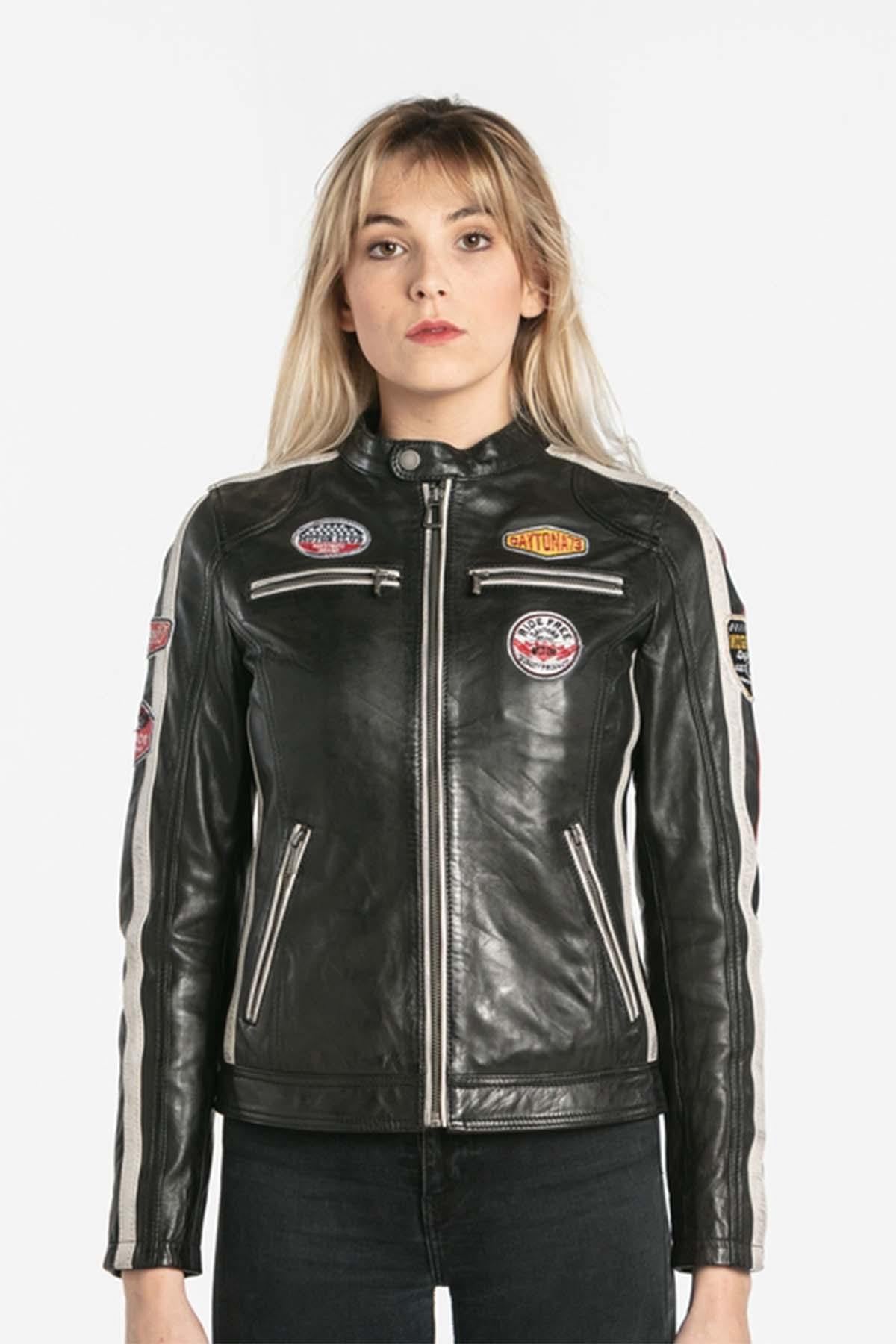 Black lambskin jacket with a glossy finish and slim moto cut. - Image n°1