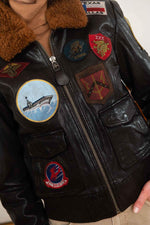 Slim maroon goatskin bomber with 17 patches and a detachable collar. - Image n°10