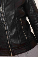 Sleek black lambskin biker jacket, effortless motard elegance. - Image n°2