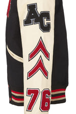 Black wool and beige leather varsity jacket for a sporty look. - Image n°12
