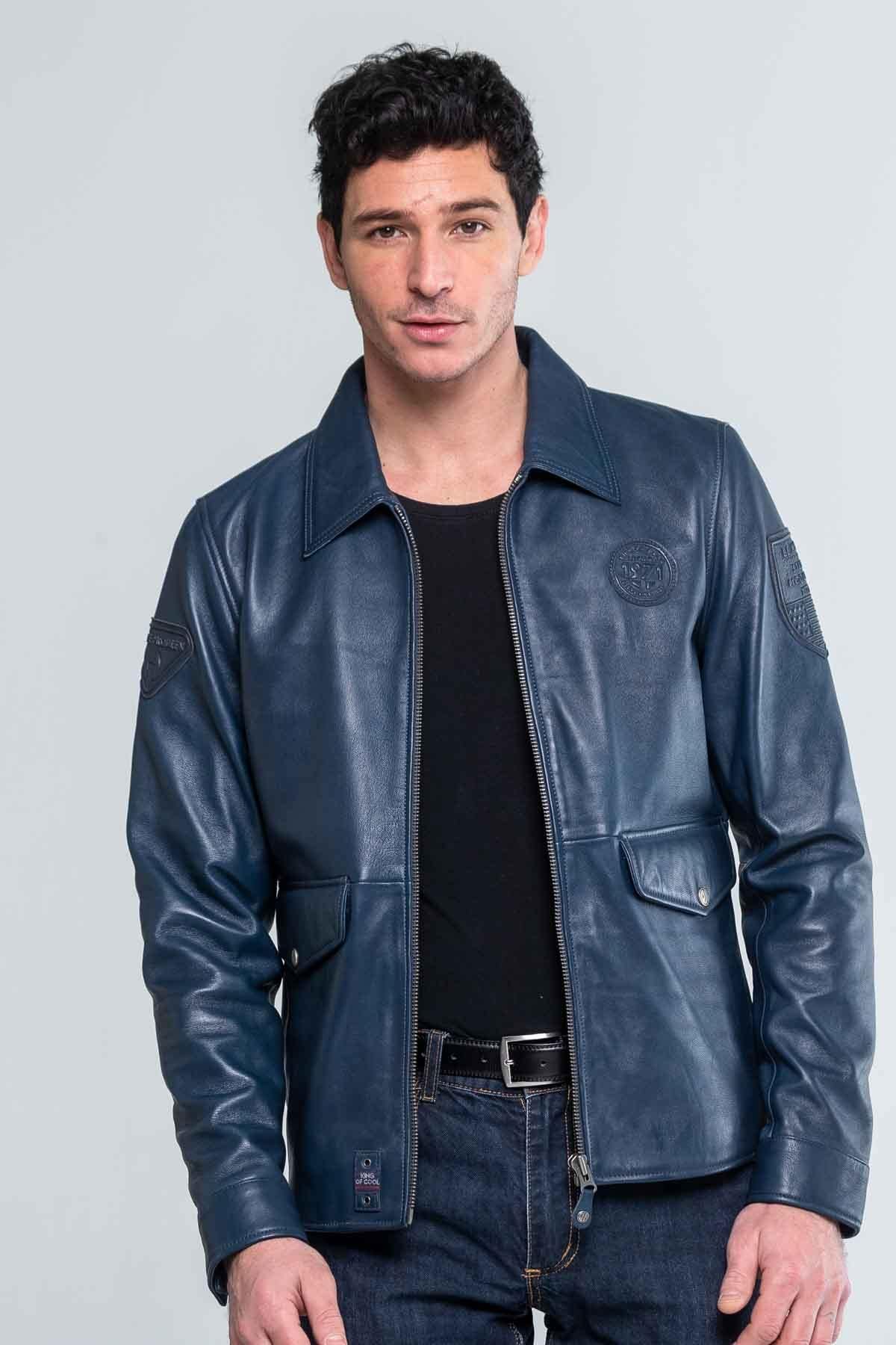 A deep blue lambskin jacket, inspired by Steve McQueen's iconic look. - Image n°1