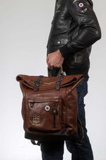 Aviator style tortoise brown leather backpack - Image n°1