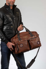 Tortoise brown leather travel bag - Image n°2