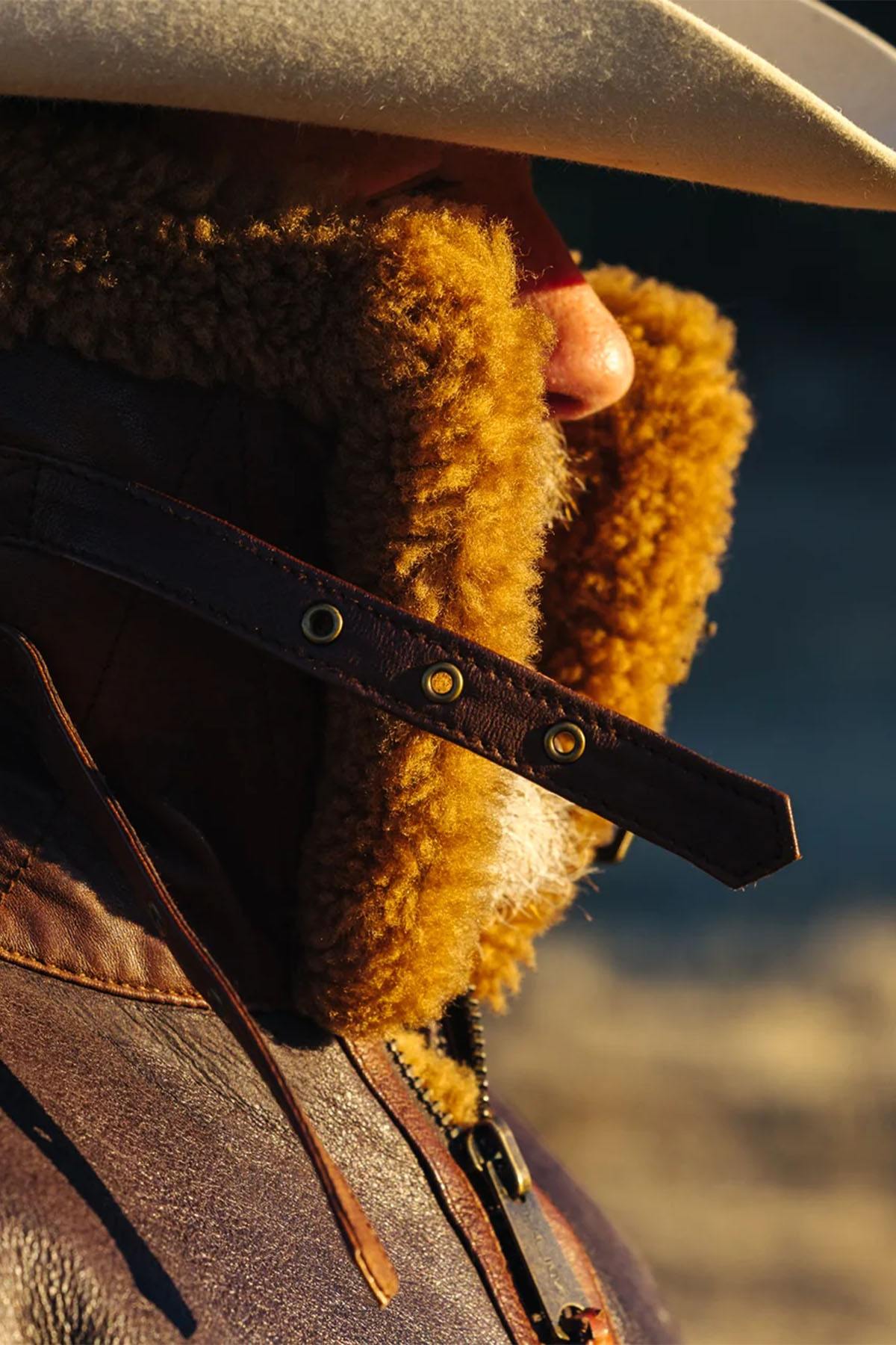 Tobacco-cognac lambskin bomber with warm shearling lining. - Image n°9