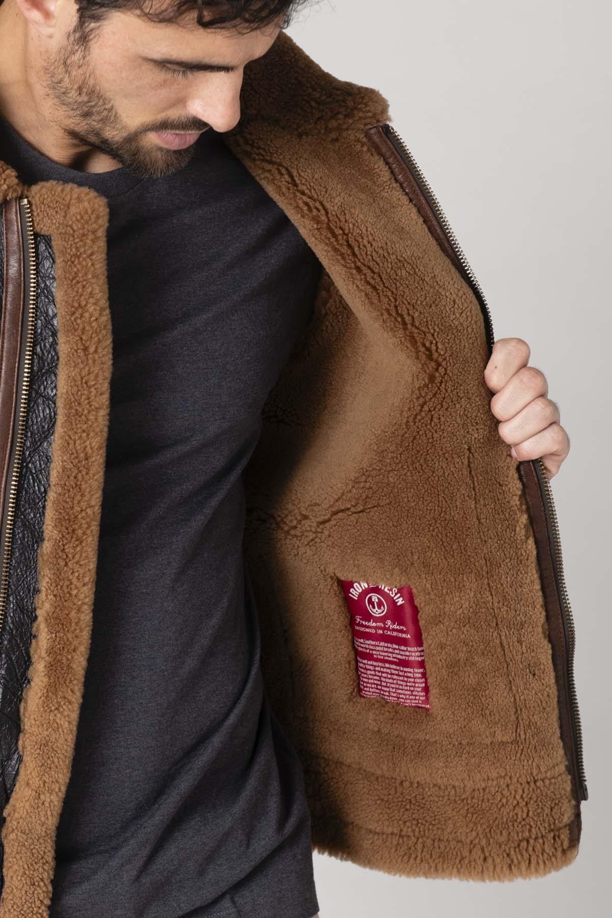 Tobacco-cognac lambskin bomber with warm shearling lining. - Image n°7