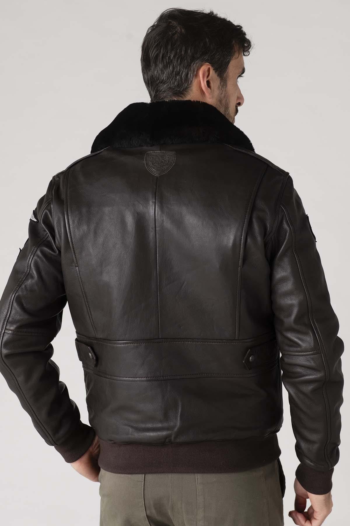 Dark brown sheepskin aviator jacket with RAF insignias and fur collar. - Image n°9