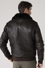 Dark brown sheepskin aviator jacket with RAF insignias and fur collar. - Image n°9