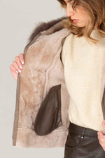 Semi-oiled Merino sheepskin jacket in grey, fox-fur hood and zips. - Image n°4