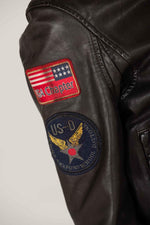Women's leather bomber jacket with patches - Image n°2