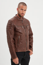 Dark cognac lambskin biker jacket with quilted shoulders and straps. - Image n°3