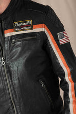 Black lambskin biker jacket with orange accents, sleek and sporty. - Image n°3