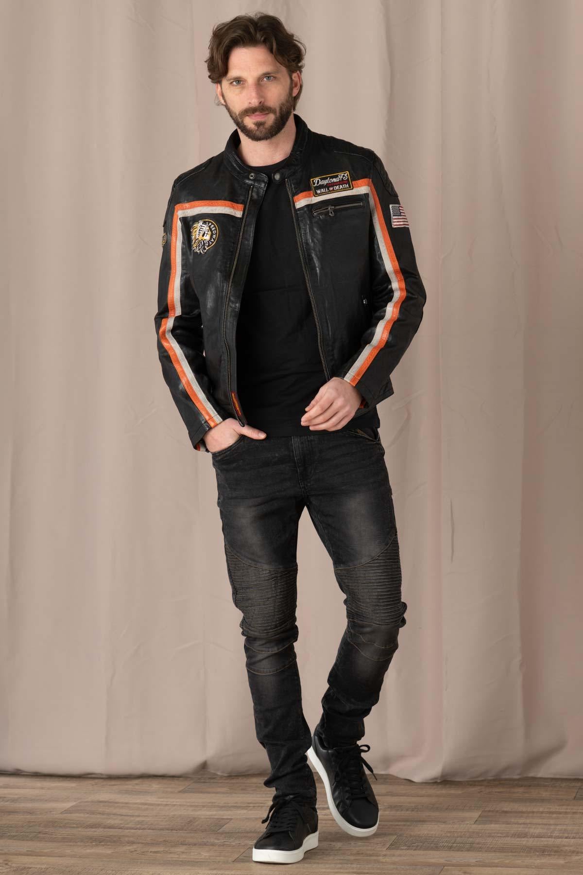 Black lambskin biker jacket with orange accents, sleek and sporty. - Image n°2