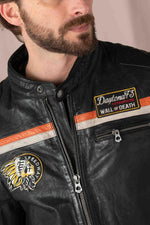 Black lambskin biker jacket with orange accents, sleek and sporty. - Image n°7