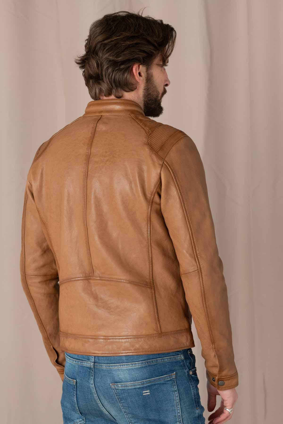 Timeless biker style in rich oxblood lambskin, textured for character. - Image n°5