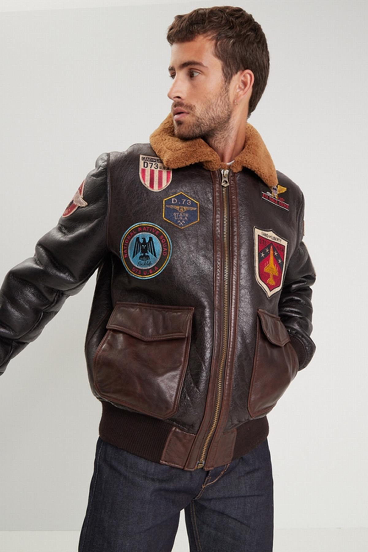 Aviator jacket in tobacco cognac. Fur collar, badge trims, slim fit. - Image n°1