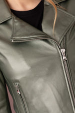 A metallic dark green sheepskin biker jacket, bold and seasonless. - Image n°11