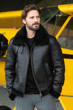 Black reversed sheep leather aviator jacket, fur-lined for warmth. - Image n°1