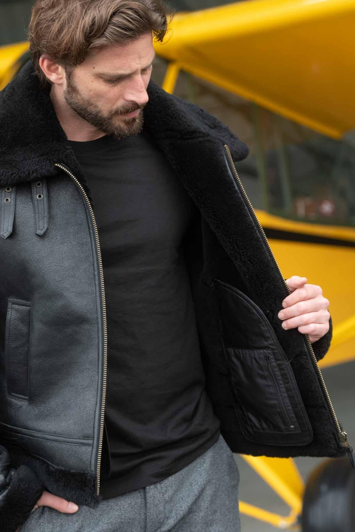 Black reversed sheep leather aviator jacket, fur-lined for warmth. - Image n°6