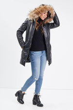 Mid-length lambskin coat with detachable hood for chic autumn wear. - Image n°2
