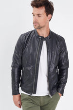 Black lambskin biker jacket, sleek and moto-inspired. - Image n°1