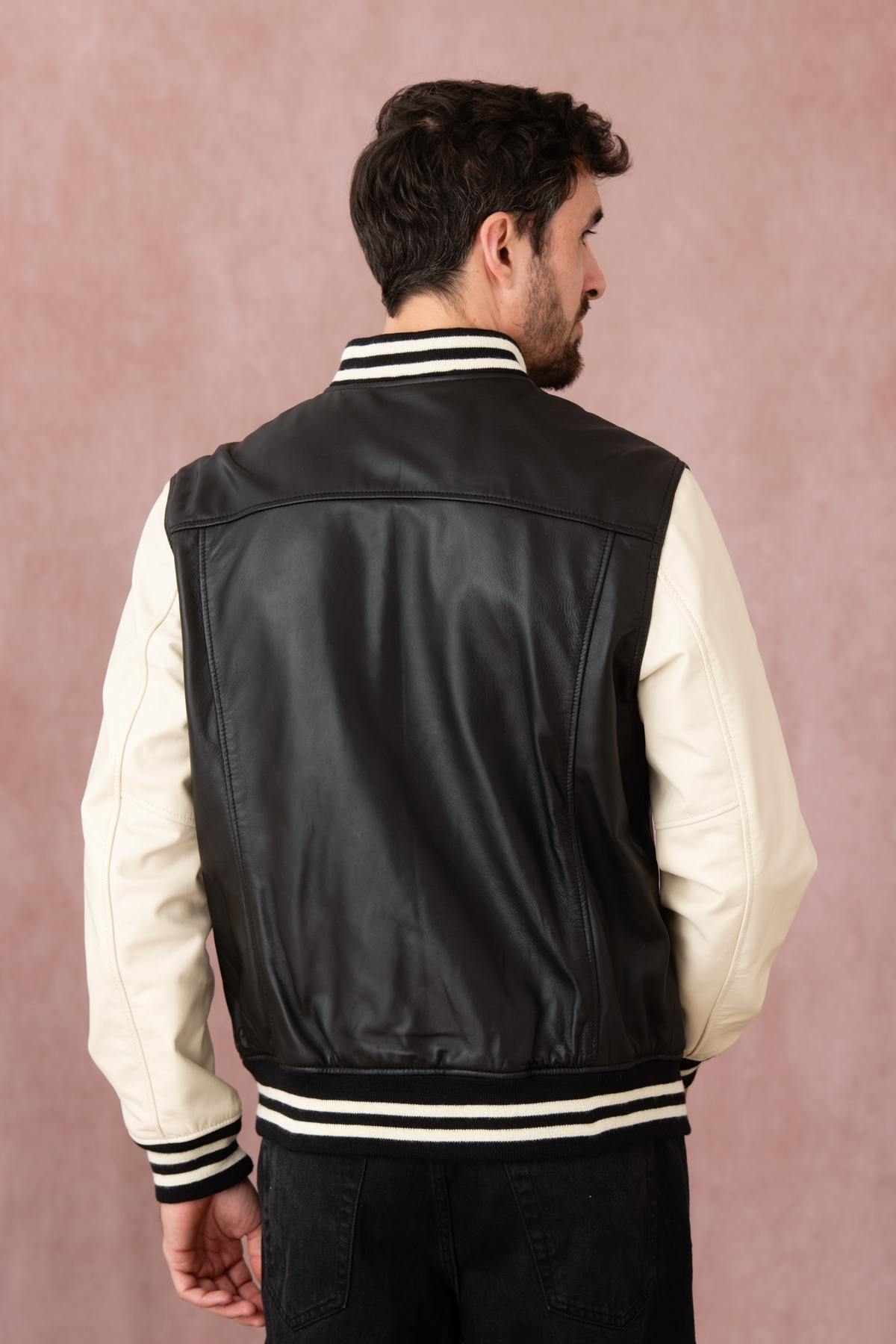 Schott's varsity-style lambskin jacket in black and off-white. - Image n°5