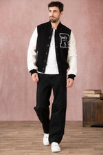 A slim-fit teddy jacket blending leather and nylon for urban style. - Image n°5