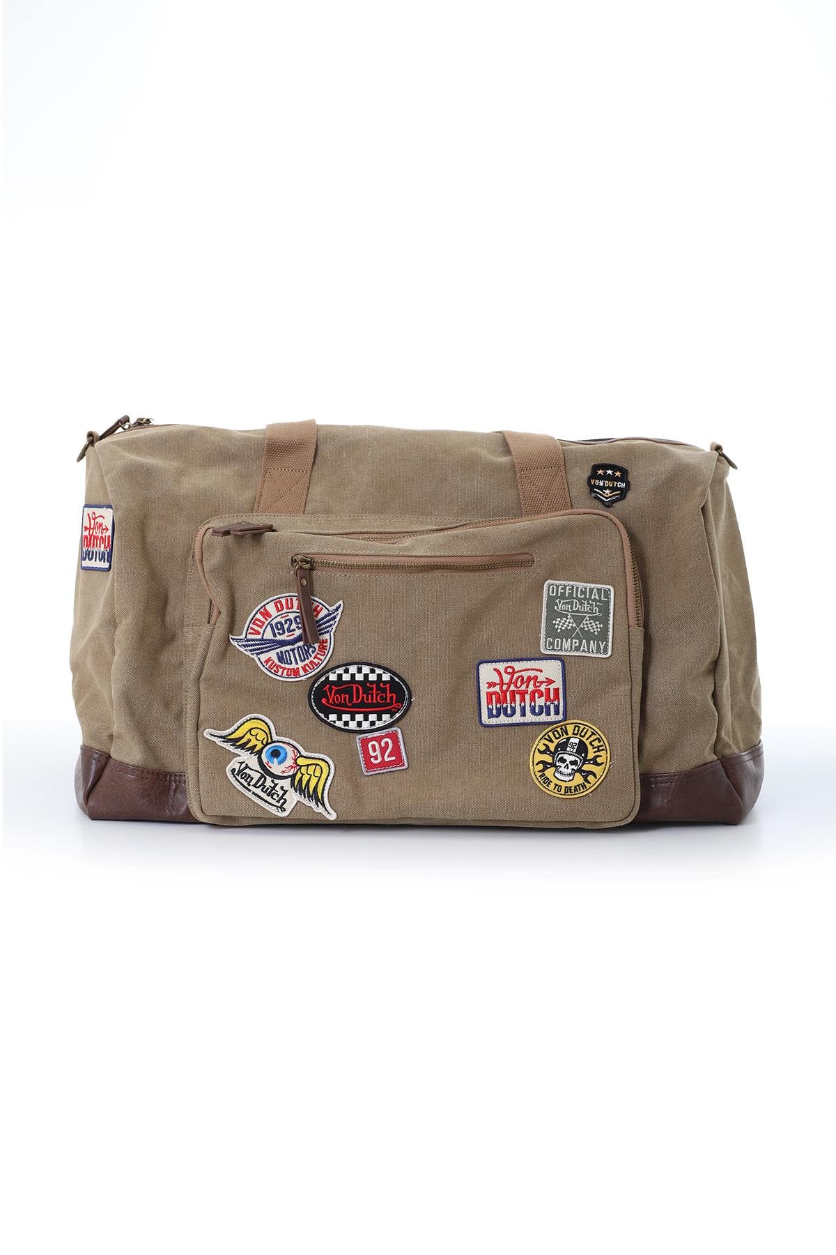 Textile travel bag with taupe and brown patches - Image n°1