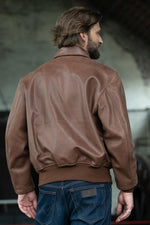 The iconic A-2 in aged russet cowhide, faithfully military-spec. - Image n°2