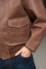 The iconic A-2 in aged russet cowhide, faithfully military-spec. - Image n°6
