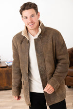 Elegant shearling coat with stand-up collar - Image n°1