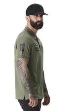 Khaki polo shirt with embroidered badges - Image n°5