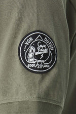 Khaki polo shirt with embroidered badges - Image n°4