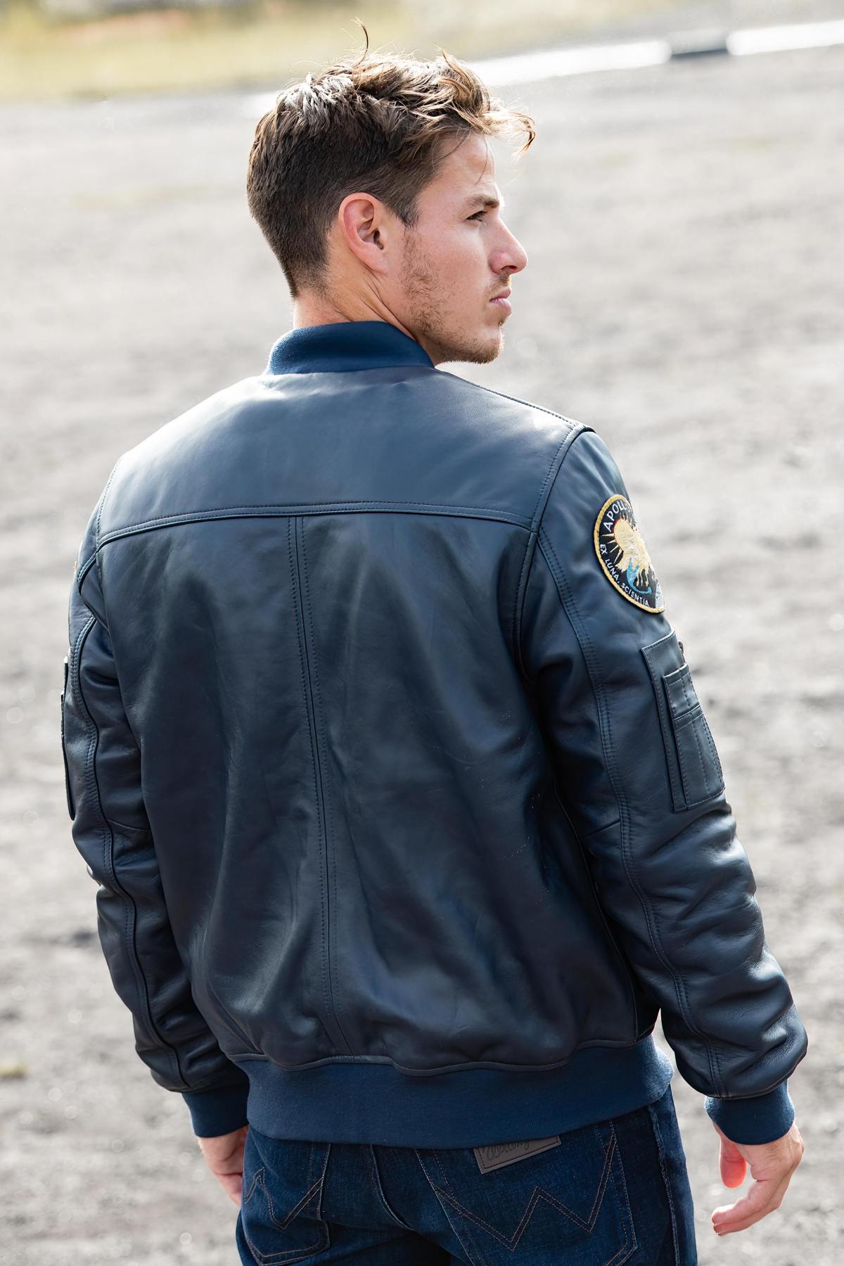 Limited-edition navy sheepskin jacket inspired by Apollo 13's legacy. - Image n°11
