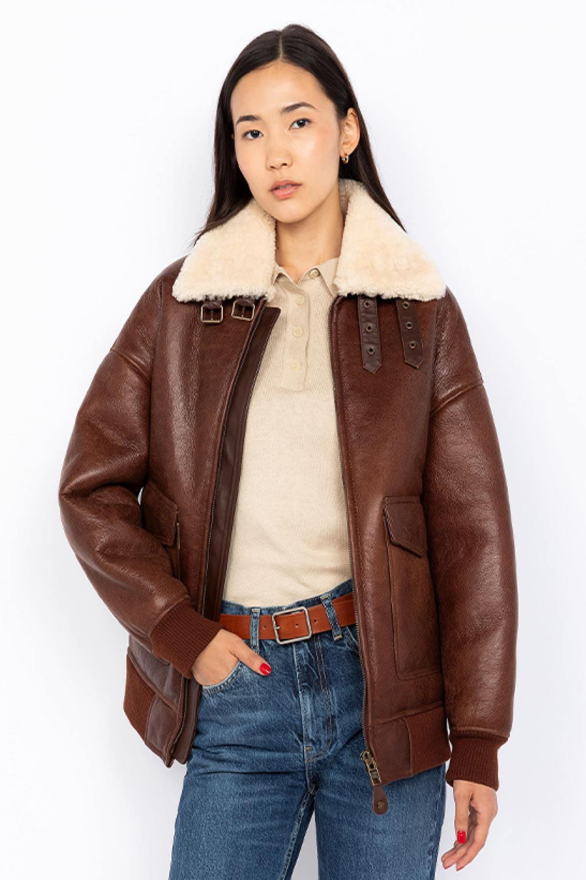 Double-faced moka sheepskin bomber by Schott. Oversized and cosy. - Image n°1