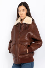 Double-faced moka sheepskin bomber by Schott. Oversized and cosy. - Image n°9